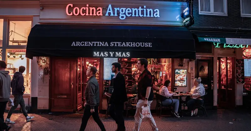 Evening view of pedestrians passing by a bustling Argentina Steakhouse in a lively urban setting.