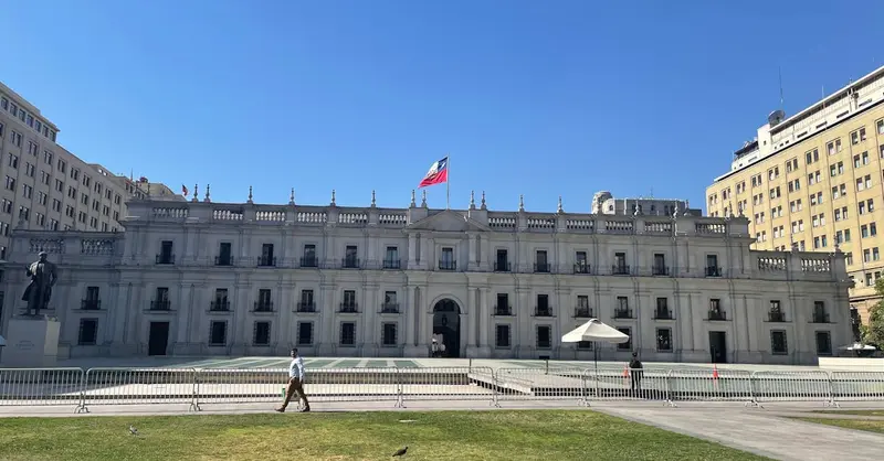 View of La Moneda Palace in Santiago, Chile on a sunny day.