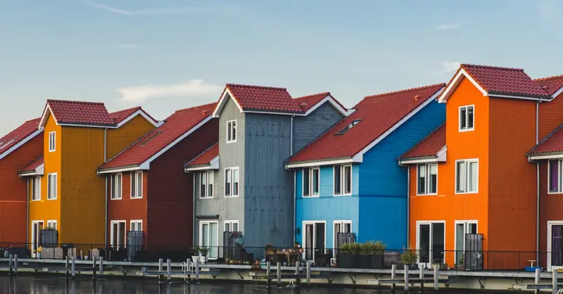 Colorful houses along the waterfront at Reitdiephaven, Groningen, Netherlands.