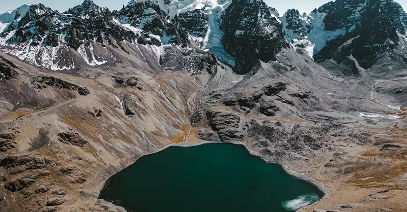 Stunning aerial view of the Condoriri mountain range and lagoon in Oruro, Bolivia.