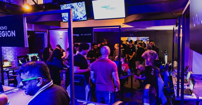 Vibrant arcade room filled with gamers participating in a competitive tournament under violet lighting.
