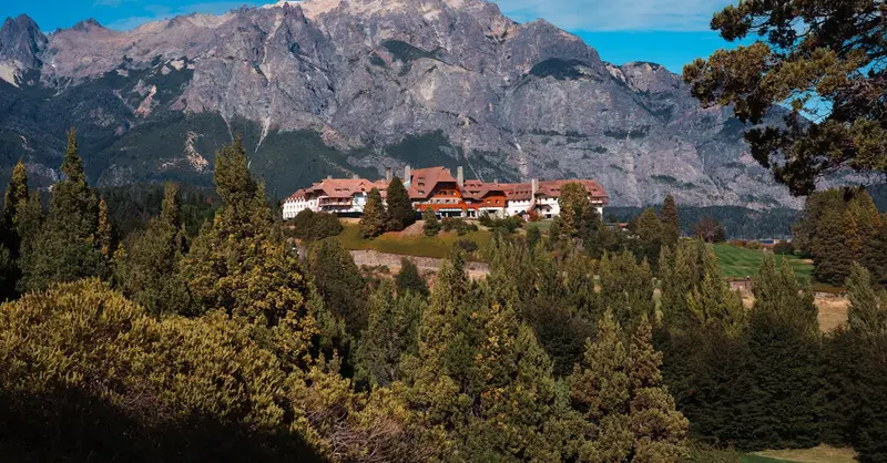 Scenic landscape of Hotel Llao Llao against Andes mountains in Bariloche, Argentina.