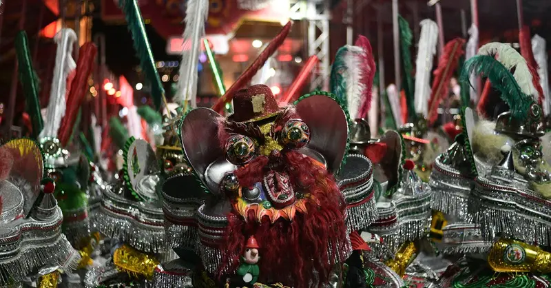 A display of vibrant traditional costumes at a Bolivian carnival, showcasing intricate designs and cultural heritage.