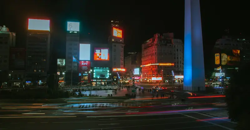 Vibrant night scene at the Obelisco in Buenos Aires, Argentina.