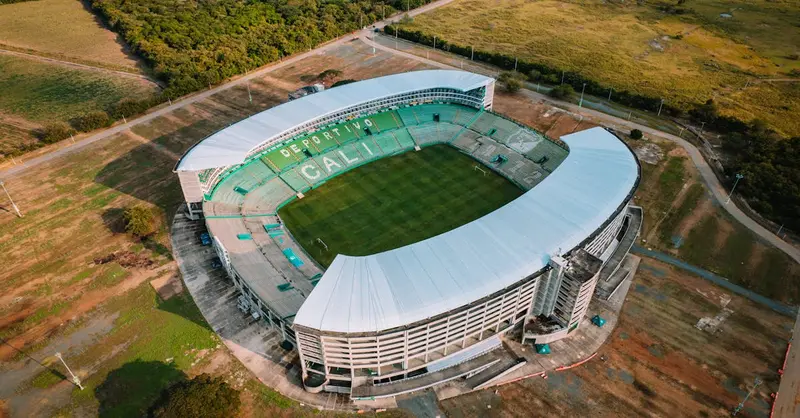 Aerial shot of the Deportivo Cali Stadium, showcasing its architecture and surrounding landscape.