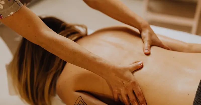 Close-up of a massage therapy session with focus on relaxation and wellness.