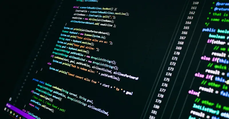 Close-up of colorful programming code on a computer screen, showcasing digital technology.