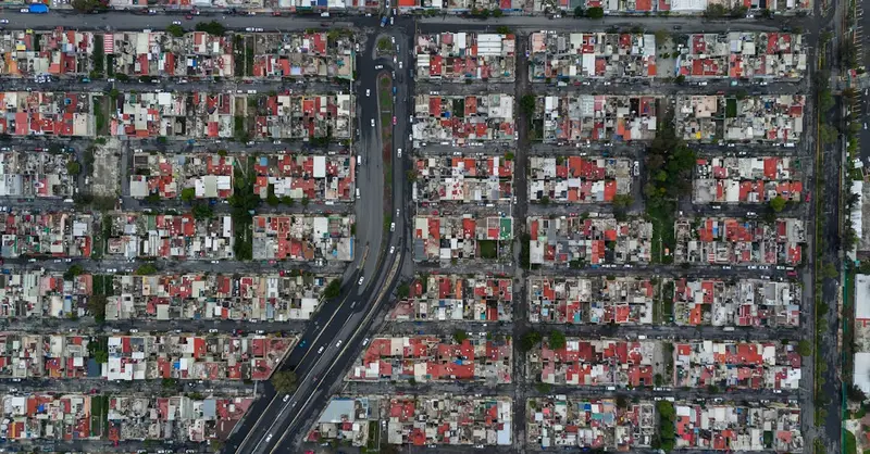 Drone image of densely packed urban grid in Ecatepec de Morelos, Mexico, showcasing the city's layout.