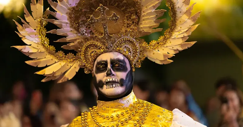 Stunning Day of the Dead costume at a colorful parade in Merida, Yucatan, Mexico.