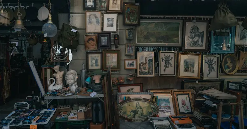 Explore a vintage shopfront in Madrid filled with eclectic antiques and artworks, capturing a nostalgic ambiance.