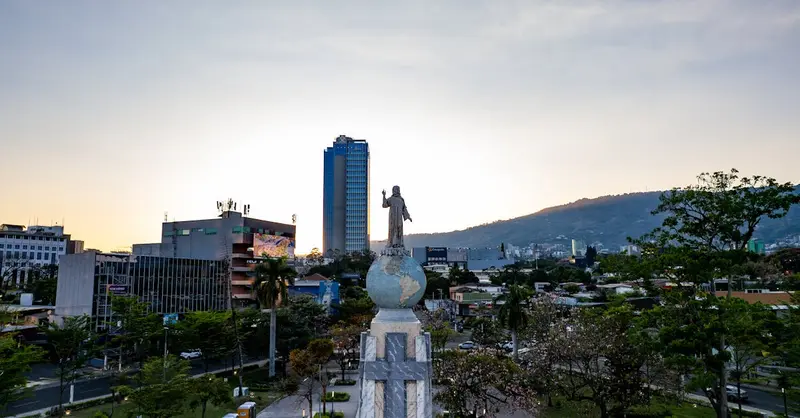 Aerial view of El Salvador del Mundo Monument at sunset in San Salvador, El Salvador.