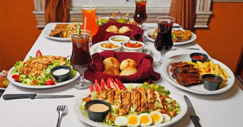 A colorful array of traditional El Salvadorian dishes on a table, perfect for food blogs.