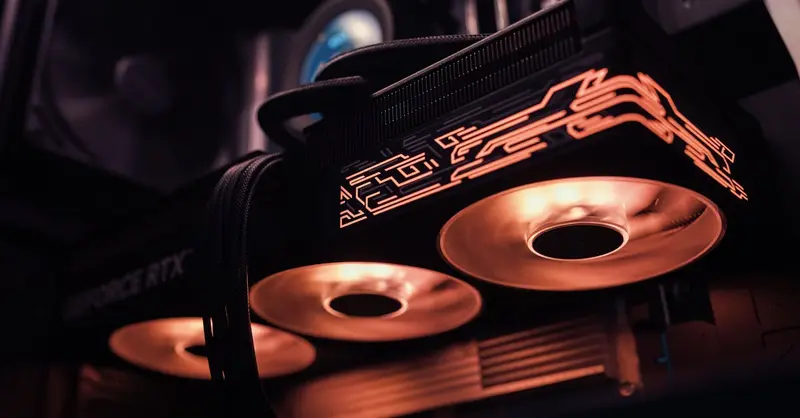 Close-up of a gaming graphics card with illuminated RGB fans, perfect for high-end gaming setups.