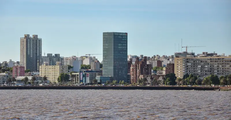 Scenic view of Montevideo's skyline with modern buildings along the waterfront.