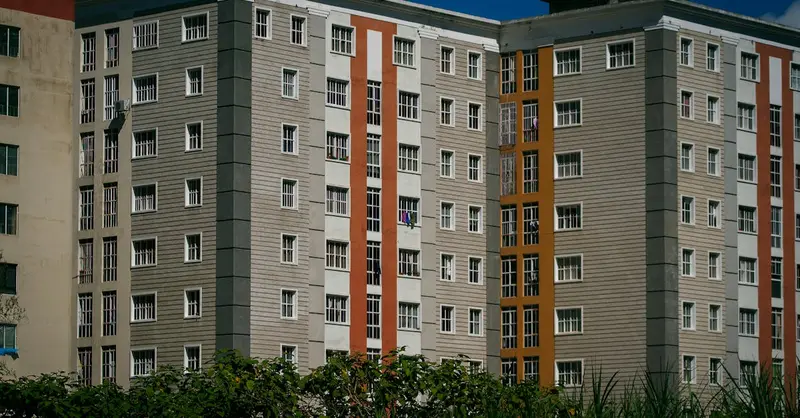 High-rise modern apartment buildings with glass windows in Venezuela, capturing architectural design.