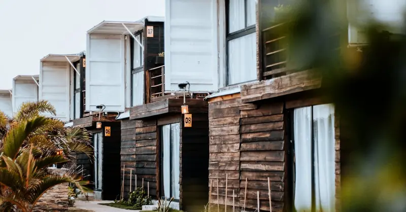 Charming wooden cottages at a resort in Adicora, Venezuela, showcasing modern architectural design.